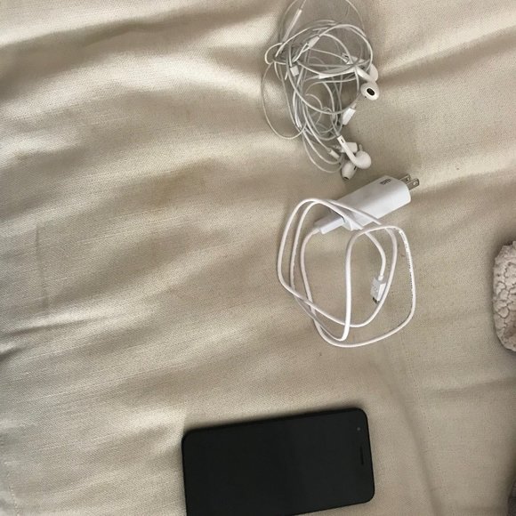 Cricket cel phone and headsets
